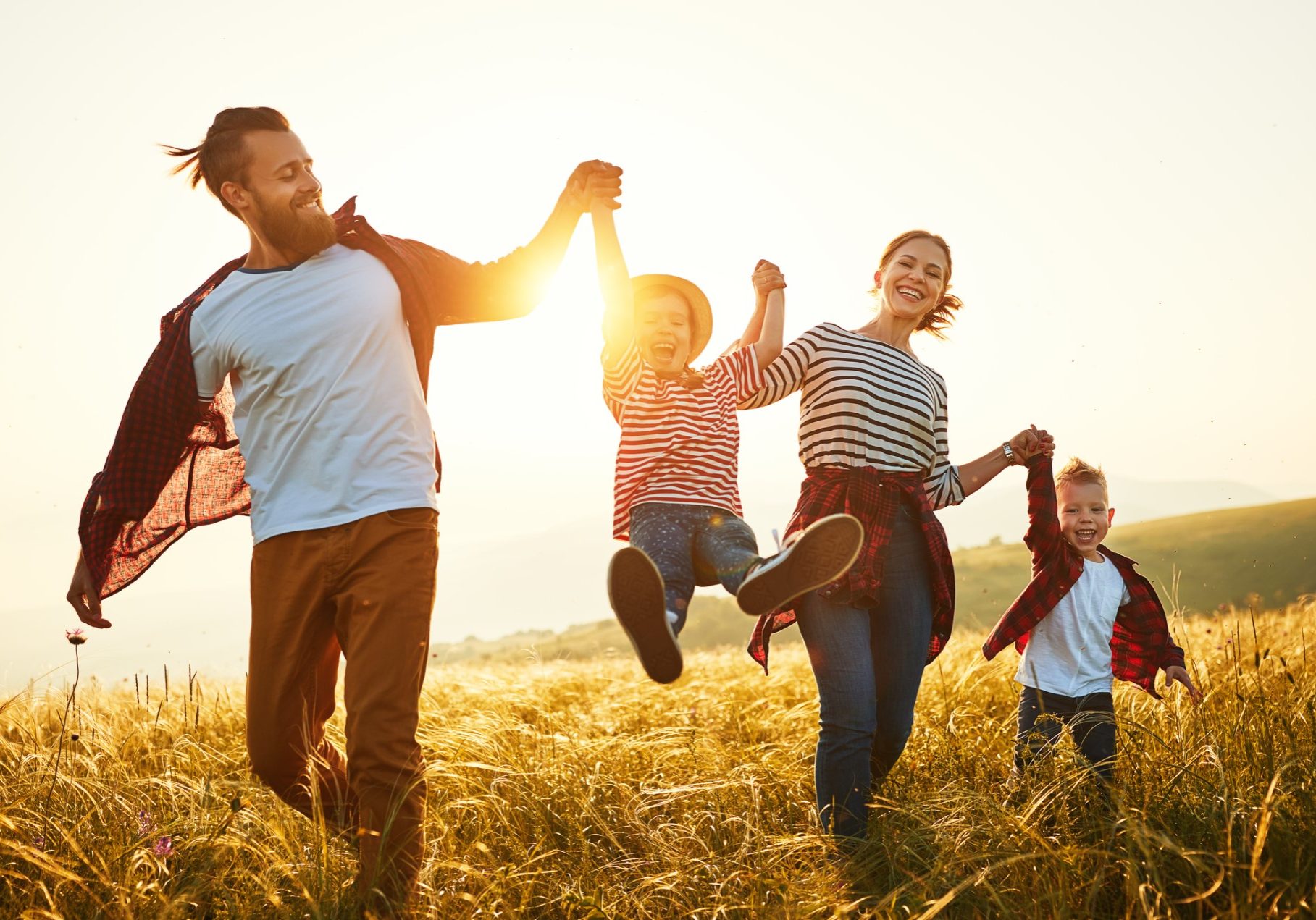 children with parents in field